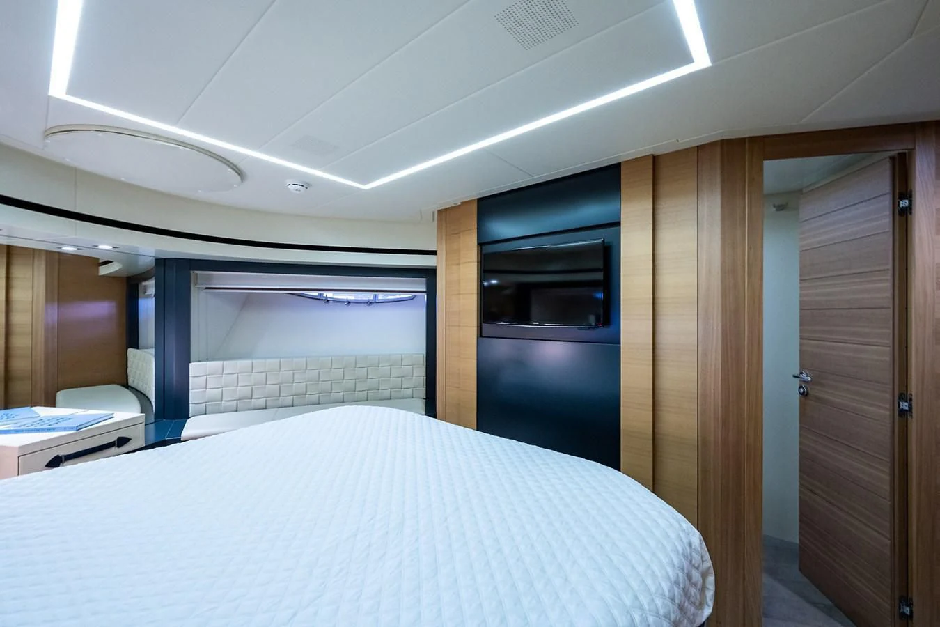 a room with a bed and a closet aboard CLAIMS TO FAME Yacht for Sale
