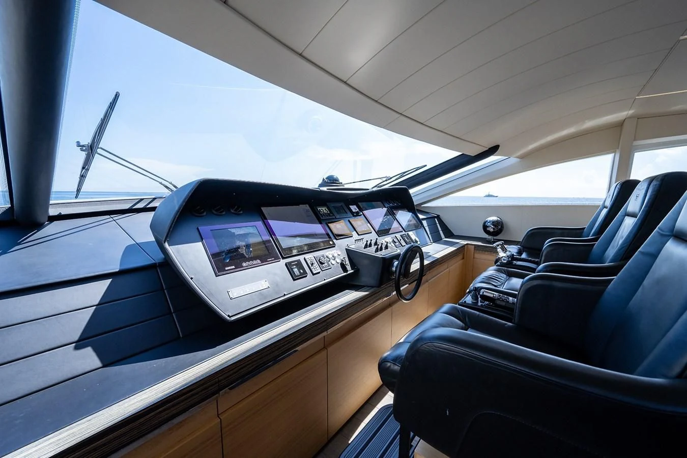 a car with a screen on the dashboard aboard CLAIMS TO FAME Yacht for Sale