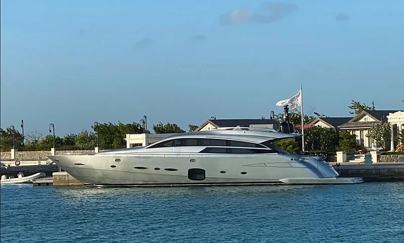 a white yacht in the water aboard CLAIMS TO FAME Yacht for Sale