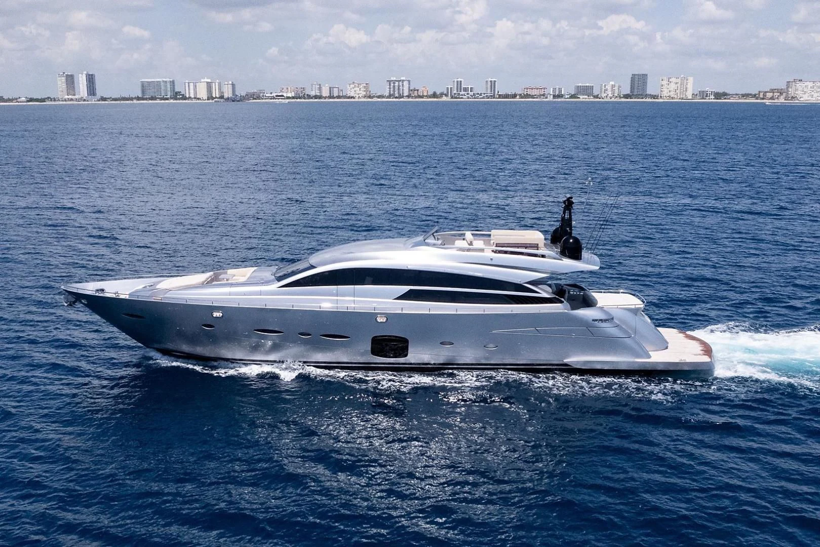 a white yacht in the water aboard CLAIMS TO FAME Yacht for Sale