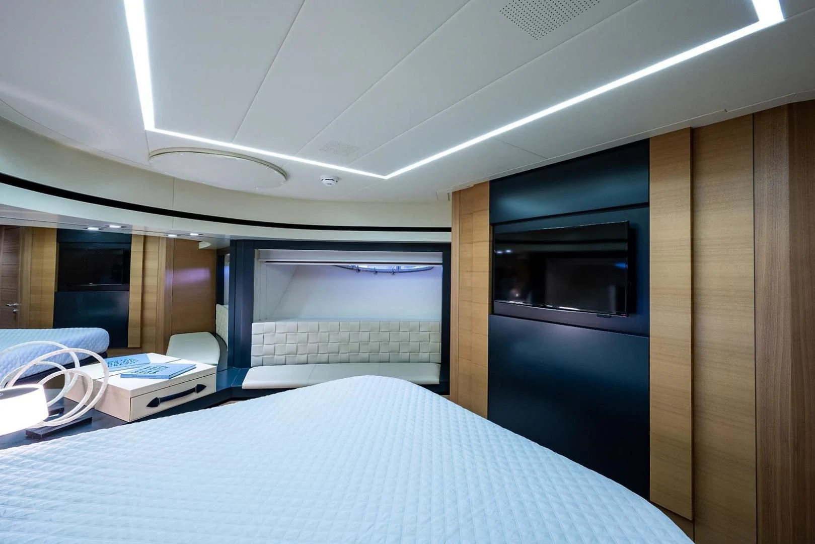 a room with a bed and a window aboard CLAIMS TO FAME Yacht for Sale