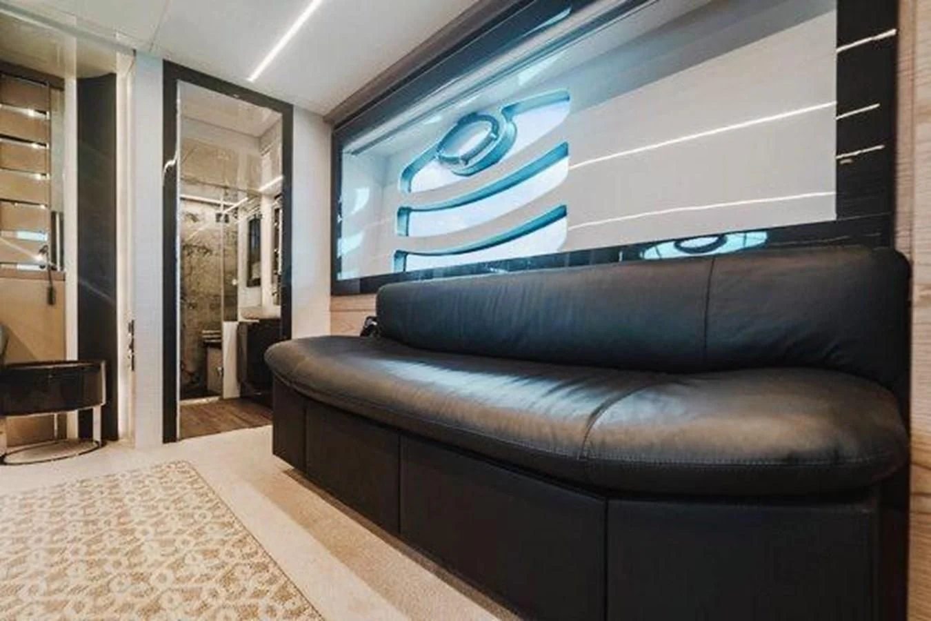 a couch in a room aboard CLAIMS TO FAME Yacht for Sale