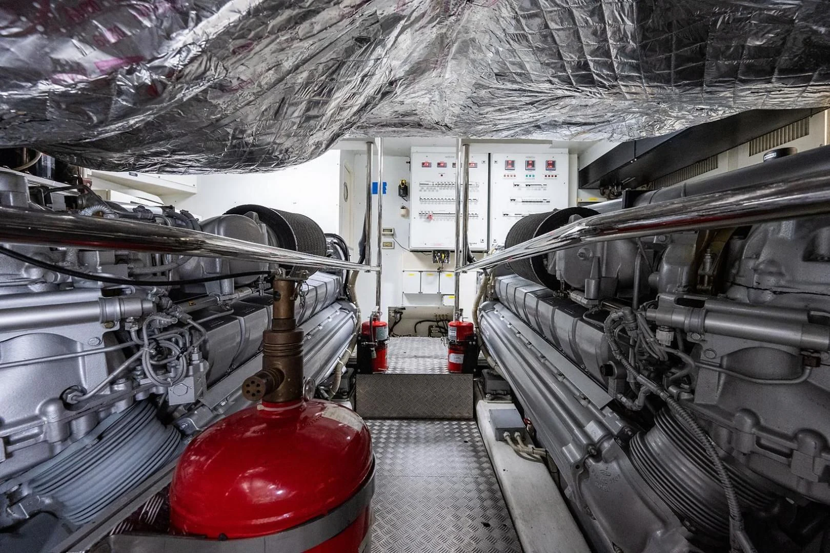 a large machine in a room aboard CLAIMS TO FAME Yacht for Sale