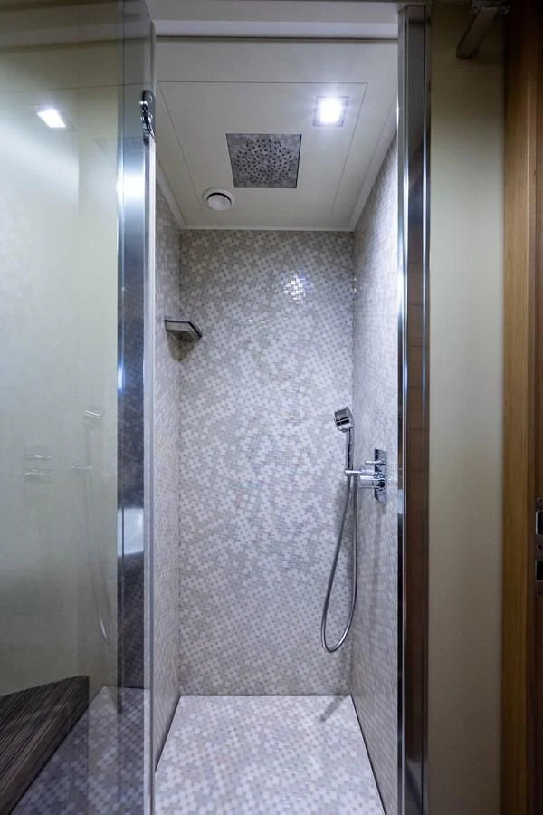 a shower unit with a glass door aboard CLAIMS TO FAME Yacht for Sale