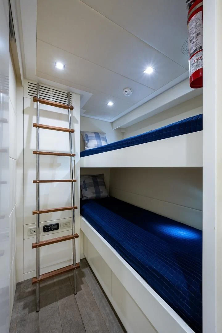 a room with a bunk bed aboard CLAIMS TO FAME Yacht for Sale