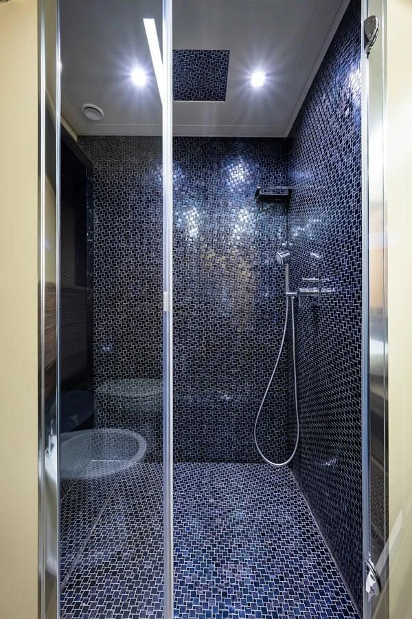 a shower unit with a shower aboard CLAIMS TO FAME Yacht for Sale