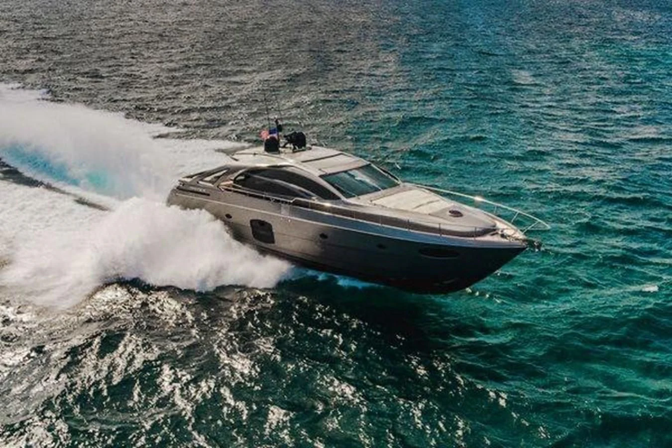 a boat on the water aboard CLAIMS TO FAME Yacht for Sale