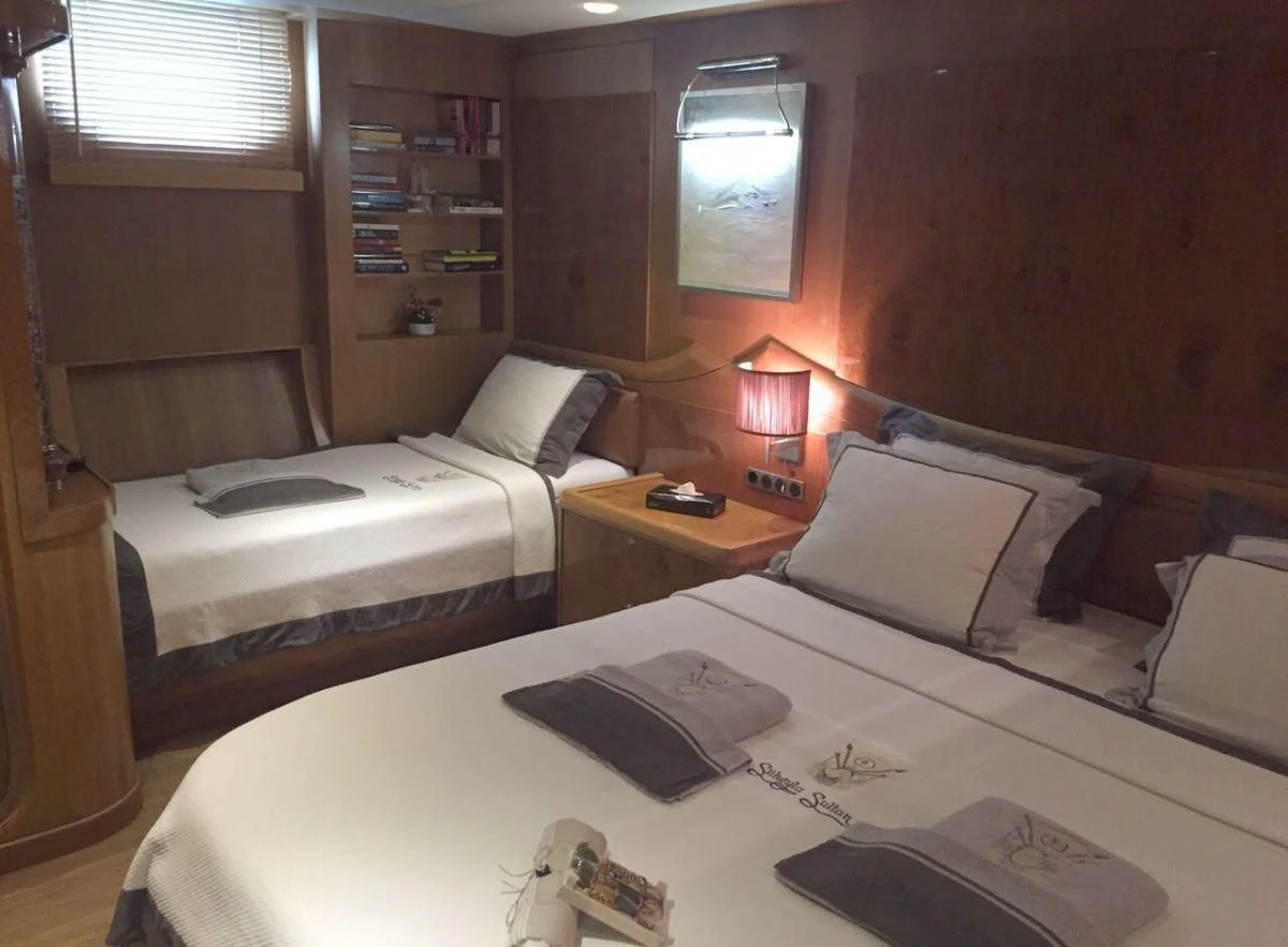 a couple of beds in a room aboard SUHEYLA SULTAN Yacht for Sale