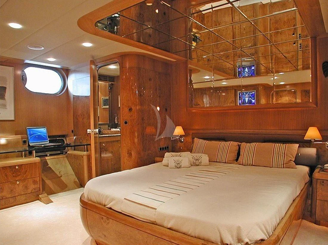 a bed in a room aboard SUHEYLA SULTAN Yacht for Sale