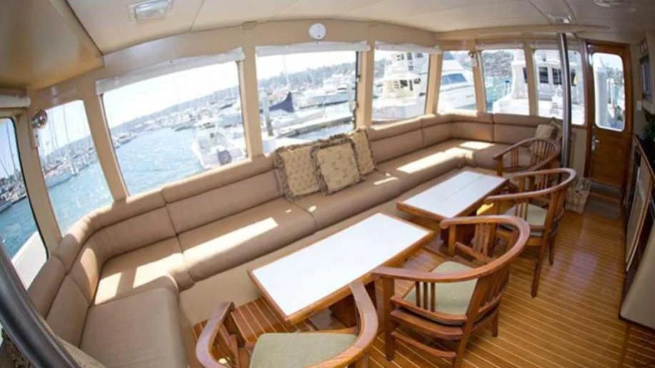 a room with a couch and chairs aboard SHERAZADE Yacht for Sale
