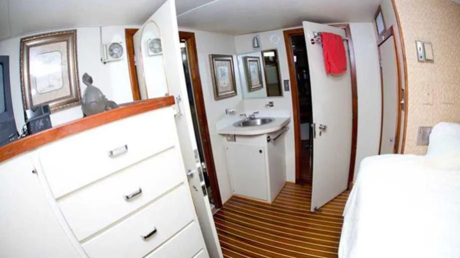 a bathroom with a sink and a mirror aboard SHERAZADE Yacht for Sale