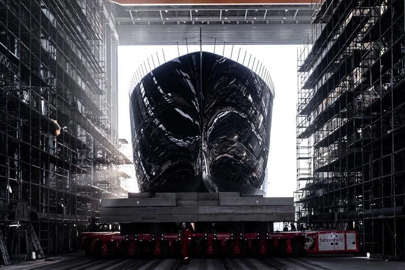 a large black ball in a city aboard LIVA Yacht for Sale