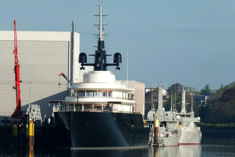 a large boat in the water aboard LIVA Yacht for Sale