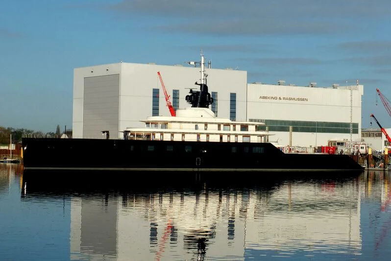 a large white boat on the water aboard LIVA Yacht for Sale
