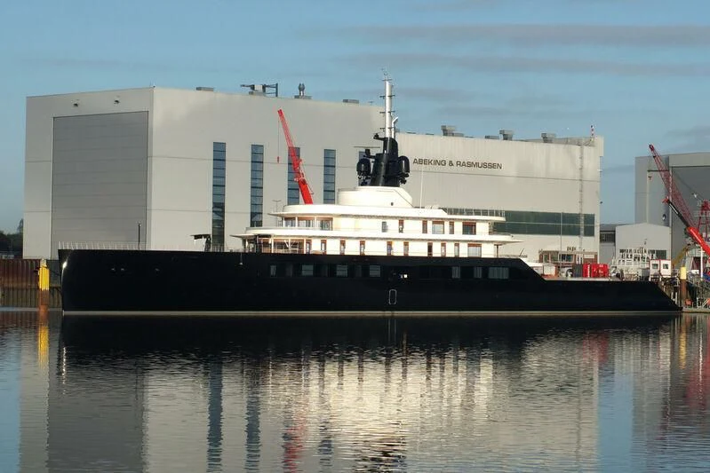 a large ship docked aboard LIVA Yacht for Sale