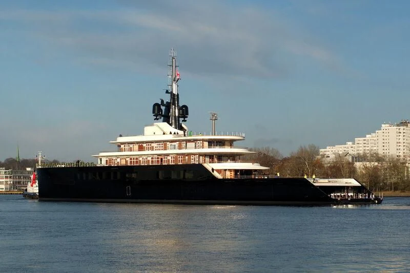 a large ship in the water aboard LIVA Yacht for Sale