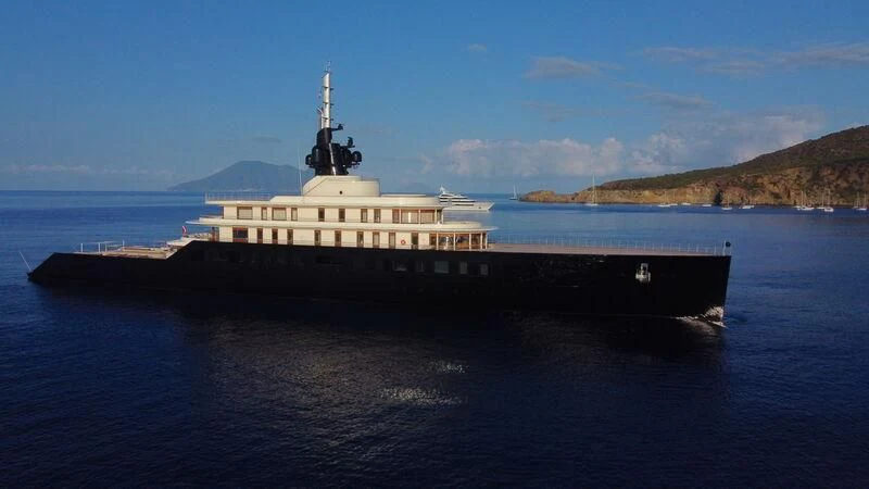 a large ship in the water aboard LIVA Yacht for Sale
