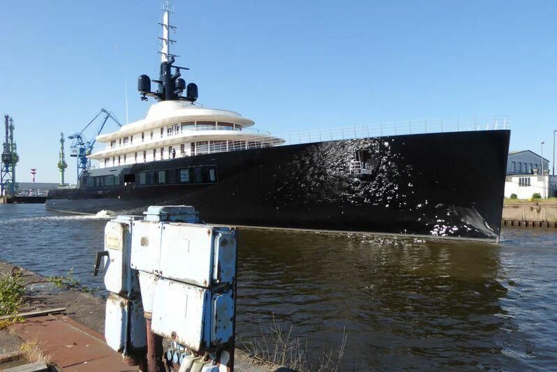 a large ship docked aboard LIVA Yacht for Sale
