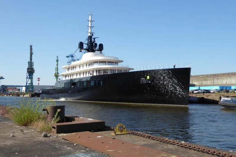 a large ship docked aboard LIVA Yacht for Sale