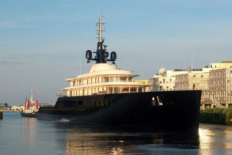 a large ship in the water aboard LIVA Yacht for Sale