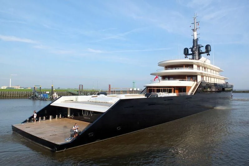 a large ship in the water aboard LIVA Yacht for Sale