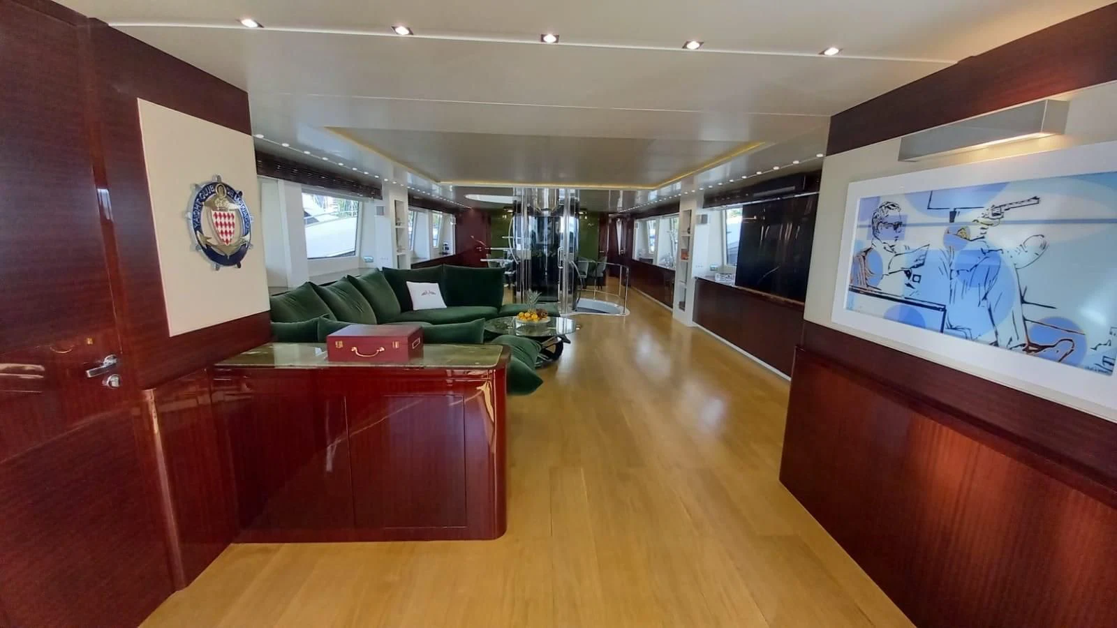 a room with a couch and a television aboard FREEDOM Yacht for Sale