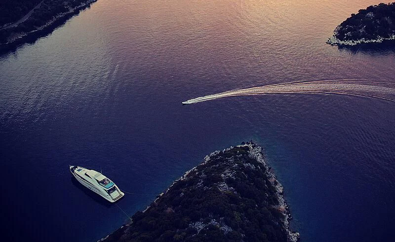 a boat on the water aboard FREEDOM Yacht for Sale