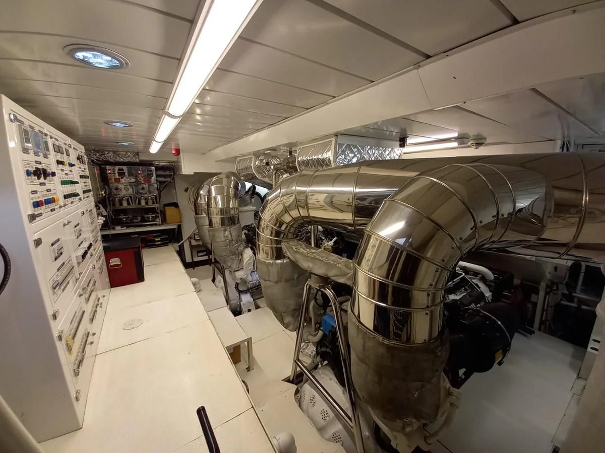 a large machine inside a building aboard FREEDOM Yacht for Sale