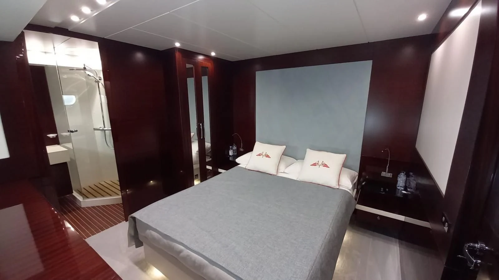 a bed in a room aboard FREEDOM Yacht for Sale