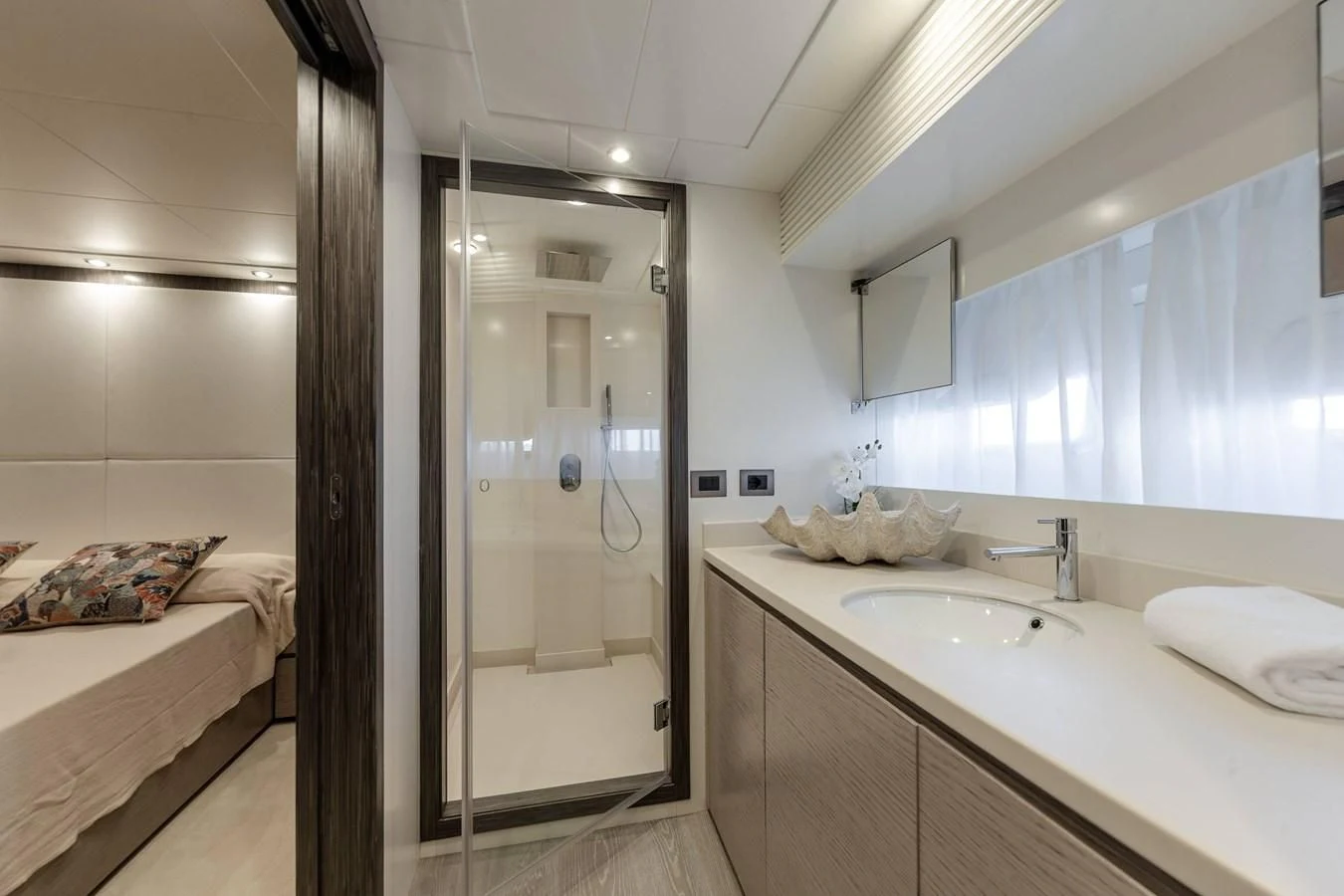a bathroom with a glass shower aboard T9 Yacht for Sale
