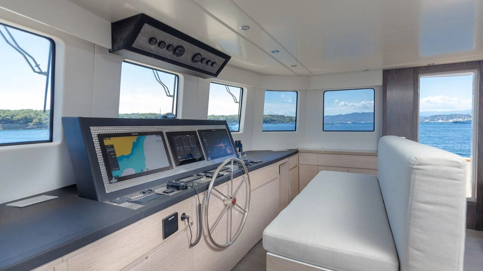 a room with a desk and a couple of computers aboard T9 Yacht for Sale