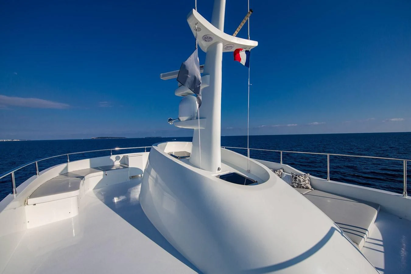 a white bathtub with a water slide and a wind turbine on the side aboard T9 Yacht for Sale