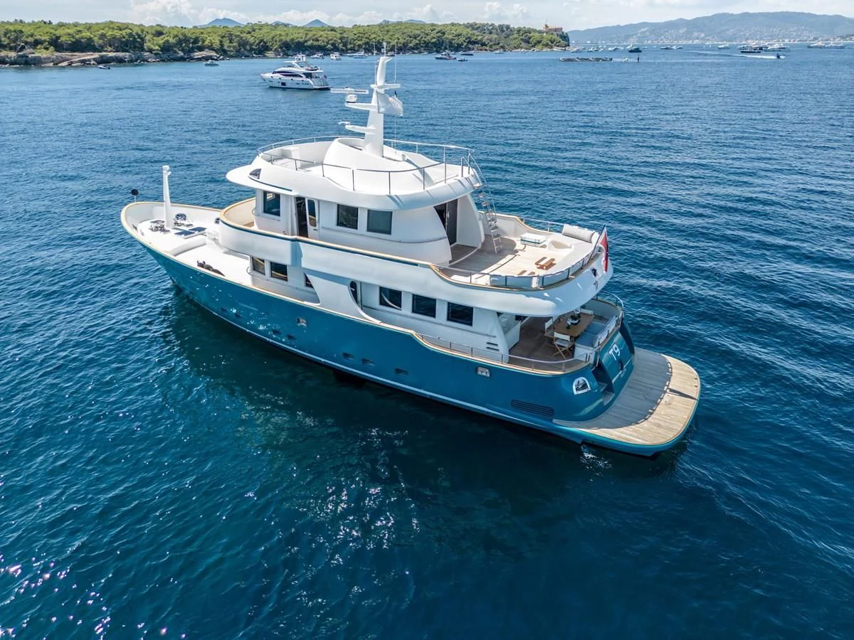 a large boat in the water aboard T9 Yacht for Sale