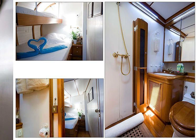 a bathroom with a blue bird on the wall aboard BAIURDO VI Yacht for Sale