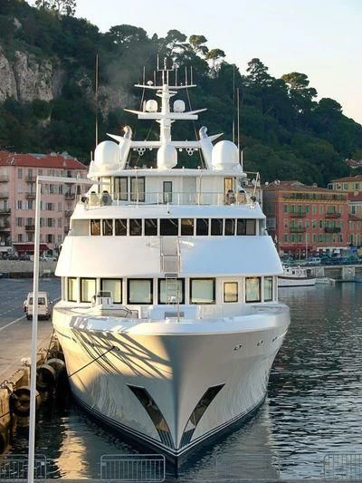a large white boat on the water aboard SAMAR Yacht for Sale