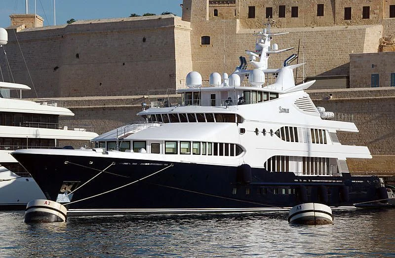 a boat docked at a pier aboard SAMAR Yacht for Sale