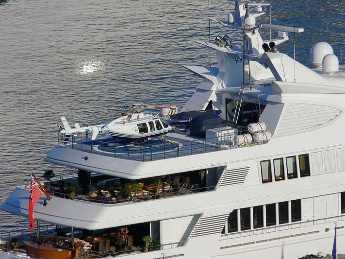 a large white boat in the water aboard SAMAR Yacht for Sale