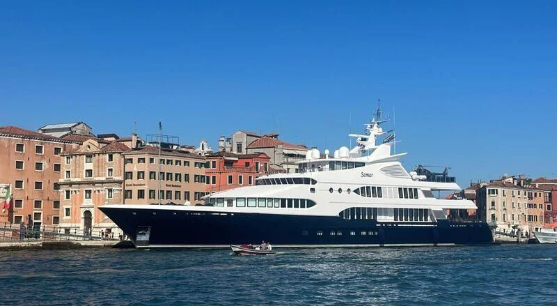 a large white boat on the water aboard SAMAR Yacht for Sale