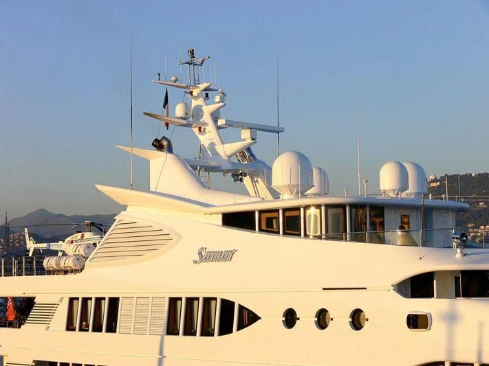 a large white boat with a helicopter on top aboard SAMAR Yacht for Sale