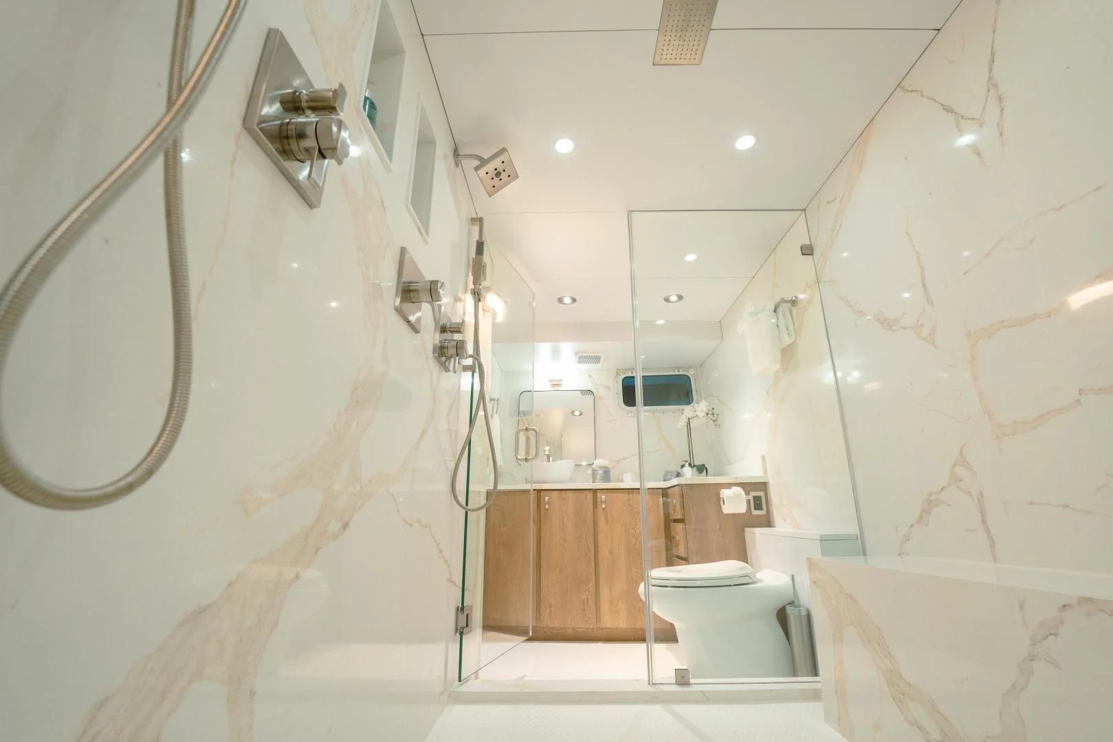 a bathroom with a shower and toilet aboard ALEXANDRA JANE Yacht for Sale