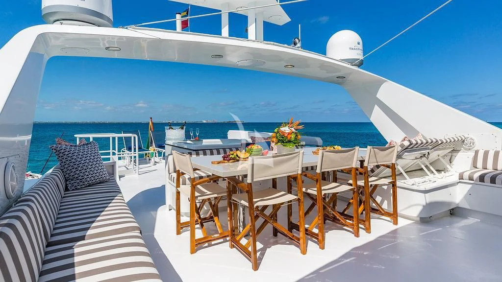 a table set for a dinner on a boat aboard ALEXANDRA JANE Yacht for Sale