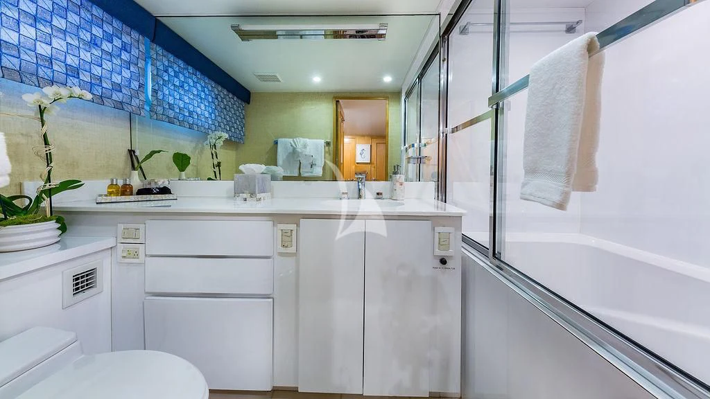 a bathroom with white cabinets aboard ALEXANDRA JANE Yacht for Sale