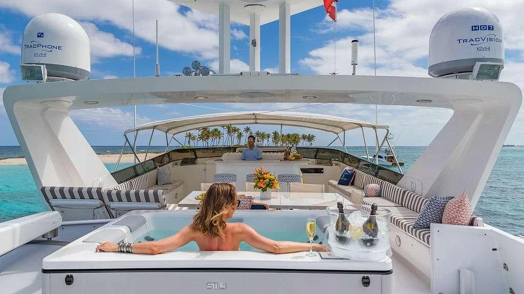 a person sitting on a boat aboard ALEXANDRA JANE Yacht for Sale