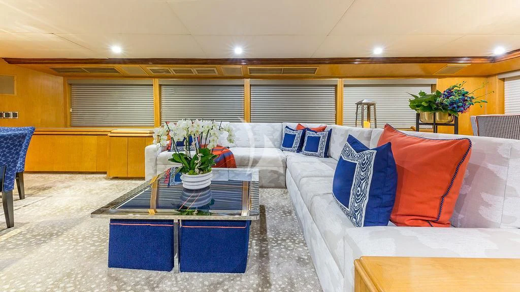 a room with couches and a table aboard ALEXANDRA JANE Yacht for Sale