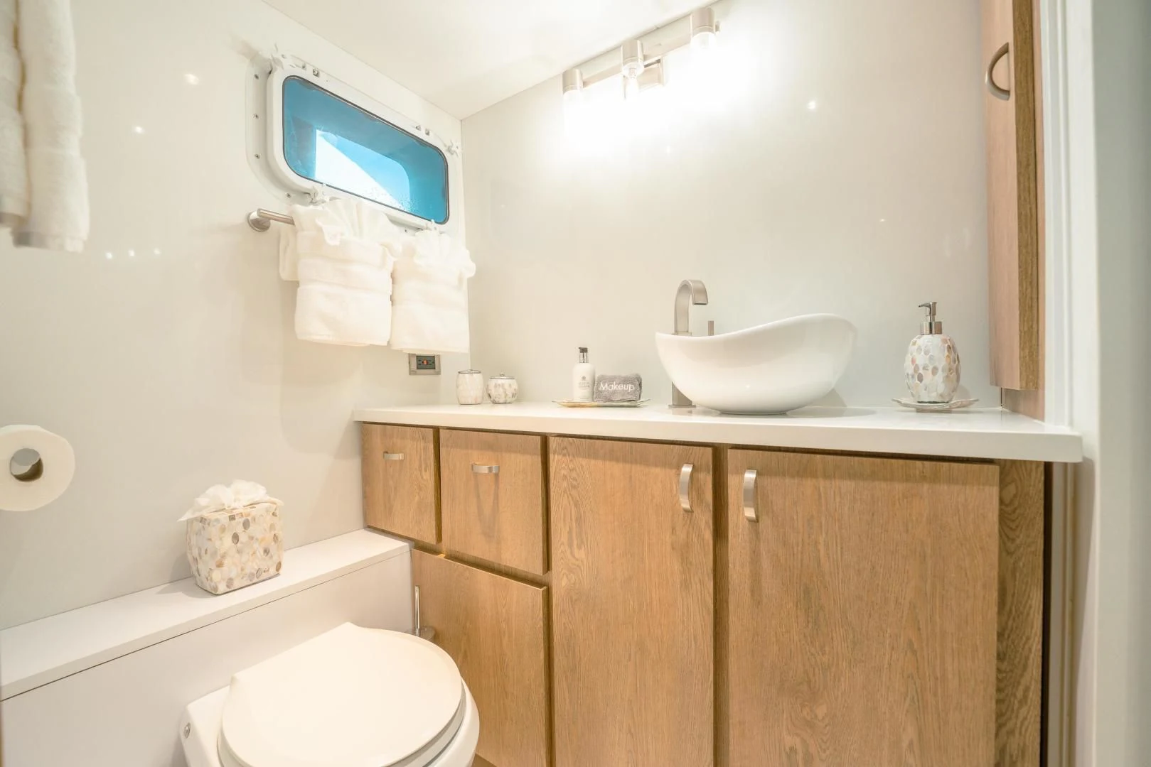 a bathroom with a sink and toilet aboard ALEXANDRA JANE Yacht for Sale