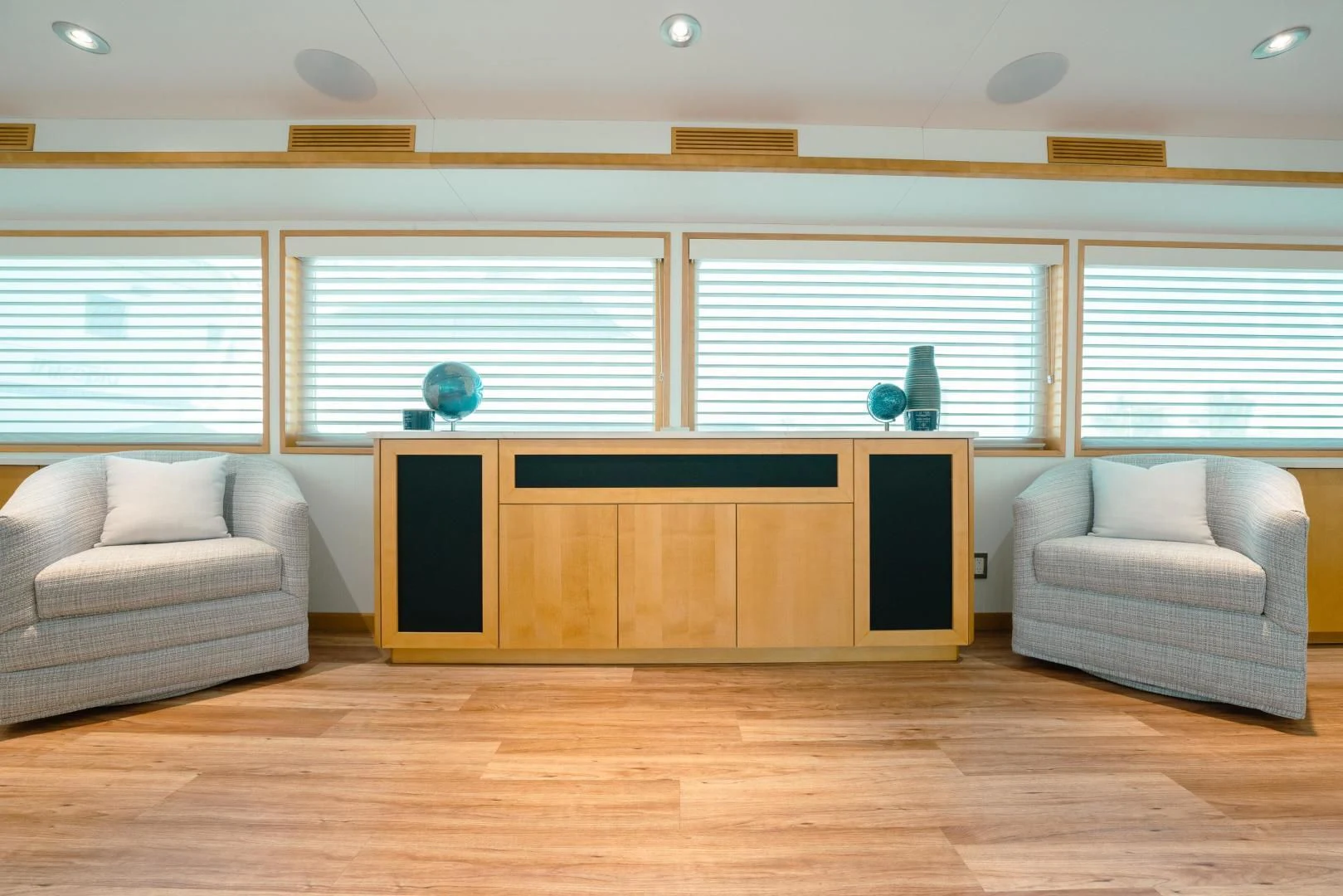 a room with a couch and a television aboard ALEXANDRA JANE Yacht for Sale
