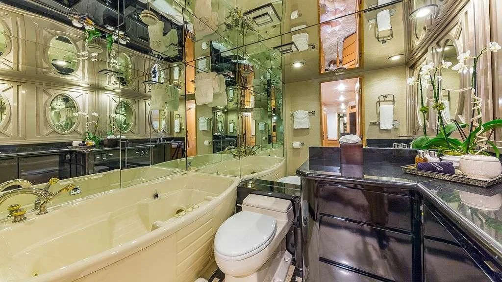 a bathroom with a sink and a toilet aboard ALEXANDRA JANE Yacht for Sale