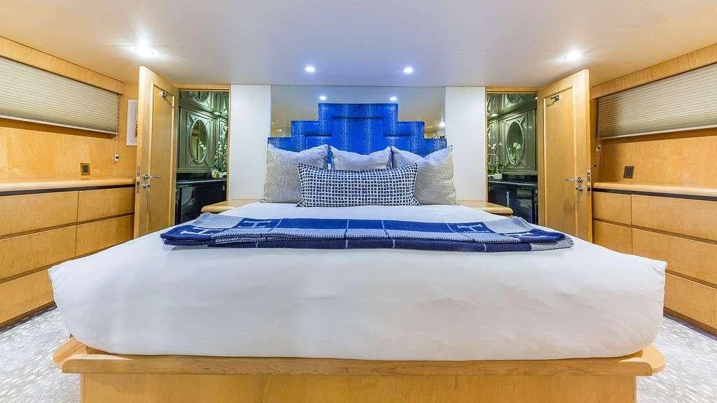 a large bed in a room aboard ALEXANDRA JANE Yacht for Sale