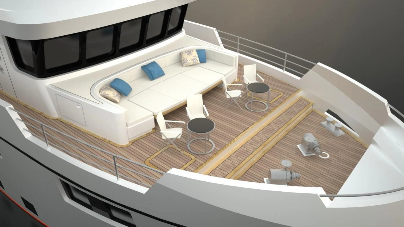 a room with a bed and chairs aboard OCEAN KING AMERICANA Yacht for Sale
