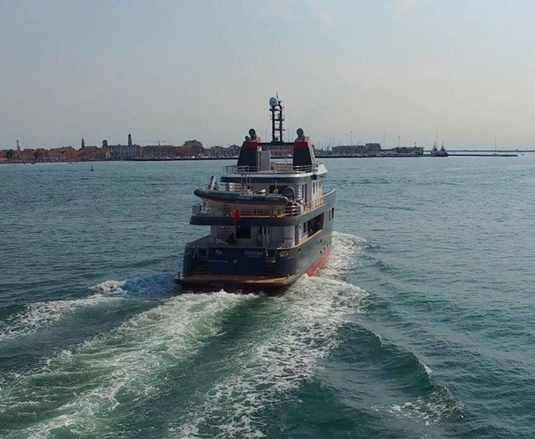 a boat on the water aboard OCEAN KING AMERICANA Yacht for Sale